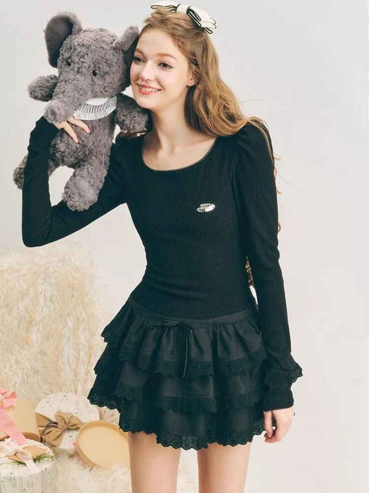 Puffy cake skirt underneath a knit dress【s0000004602】