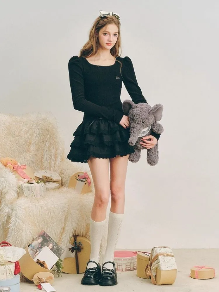 Puffy cake skirt underneath a knit dress【s0000004602】